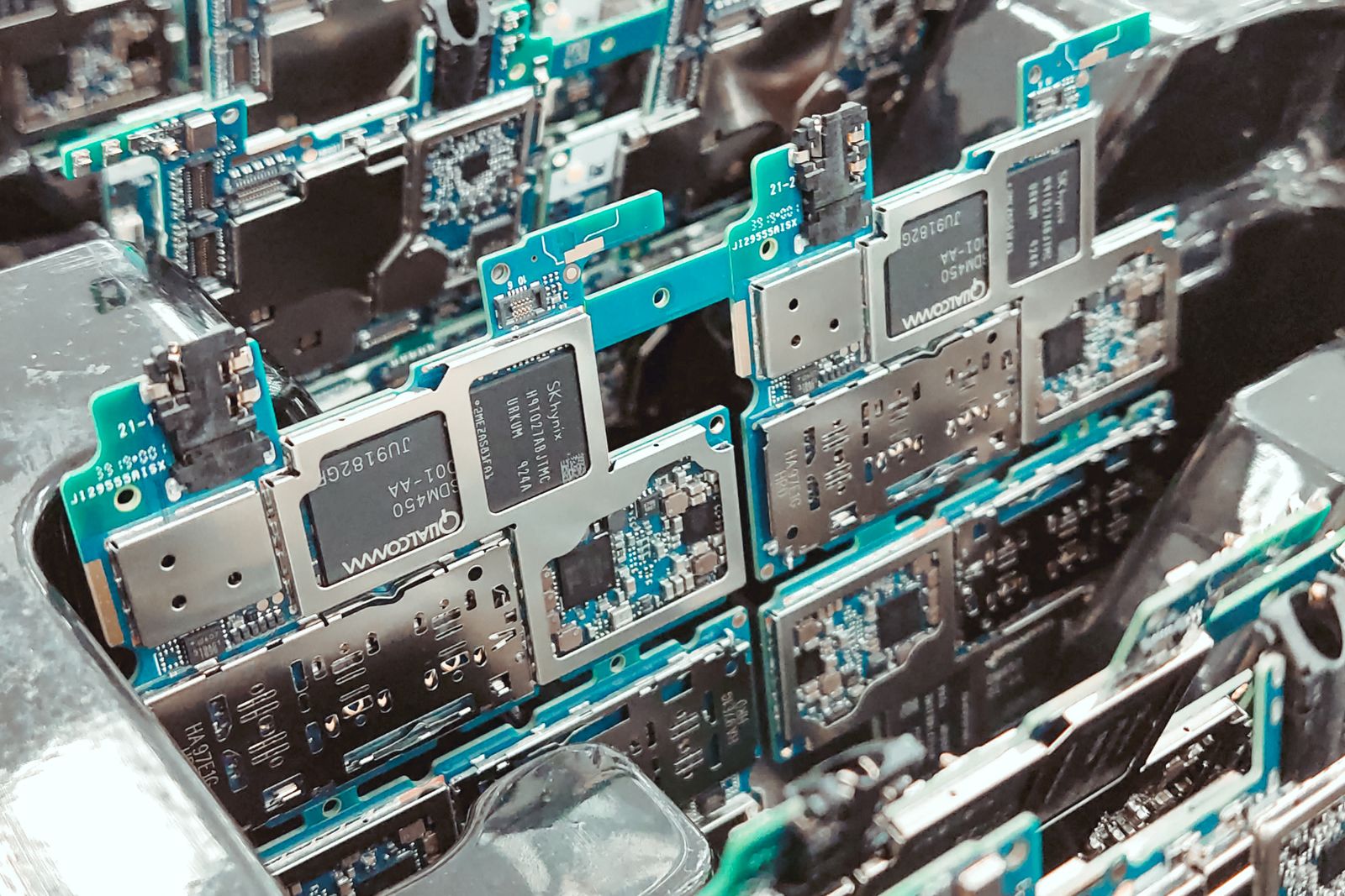 An array of printed circuit boards in electronics production